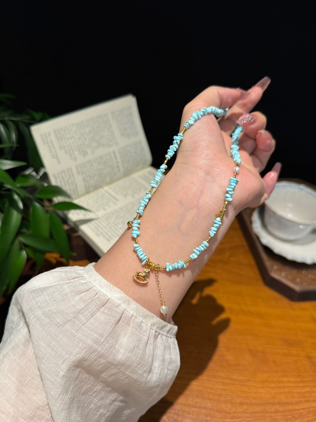 Natural Turquoise Heishi Beaded Necklace with Gold Rocking Horse Charm — A Wish for Pure Joy and Smooth Journeys