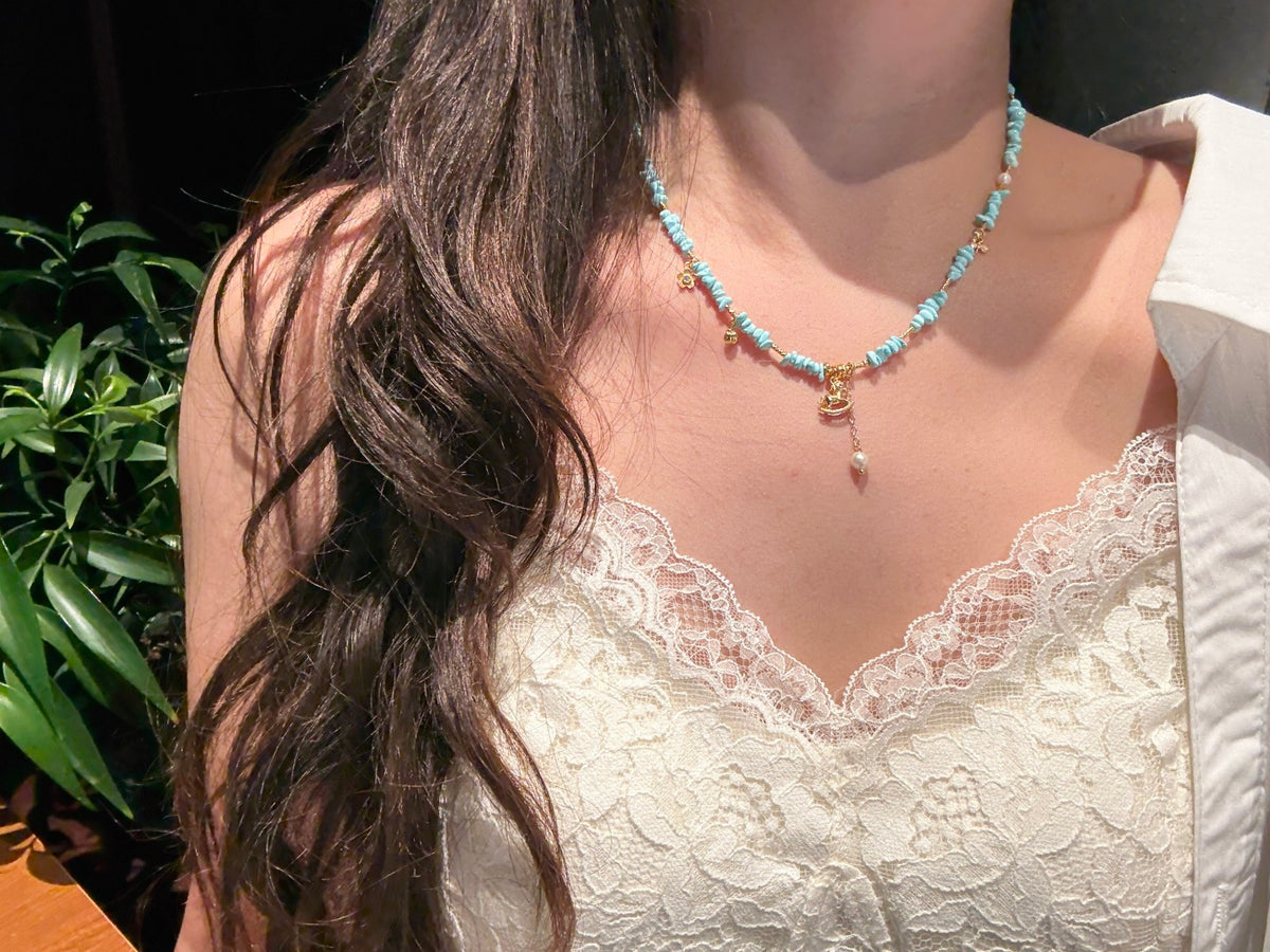 Natural Turquoise Heishi Beaded Necklace with Gold Rocking Horse Charm — A Wish for Pure Joy and Smooth Journeys